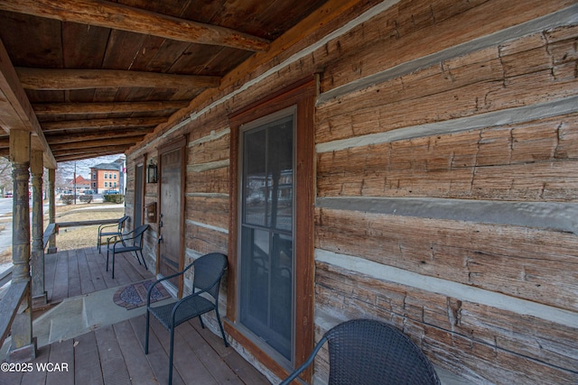 wooden terrace with covered porch