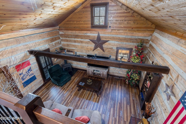 living room with lofted ceiling, wood ceiling, and wood finished floors