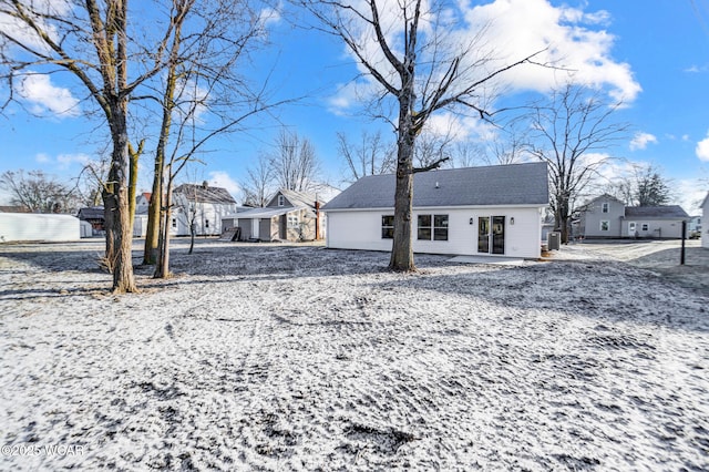 view of snow covered property