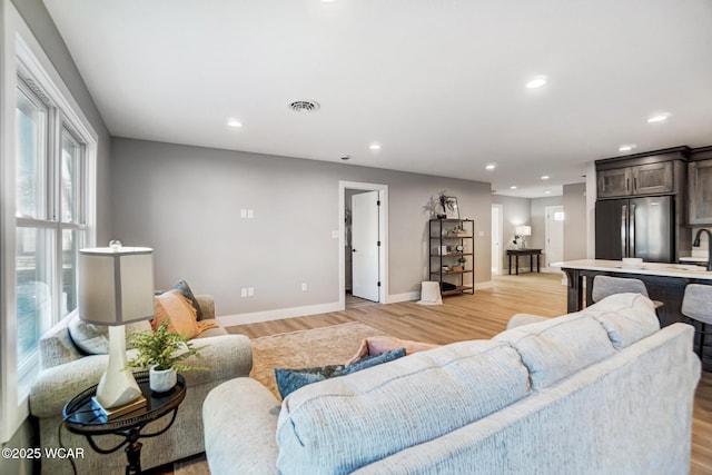 living room featuring light hardwood / wood-style floors