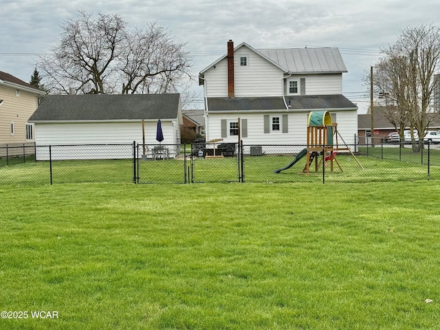 111 E Ottawa-Glandorf Rd, Ottawa, OH 45875 - rear view of house featuring a chimney, a playground, a fenced backyard, a yard, and cooling unit
