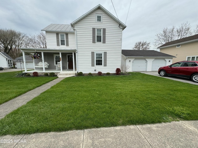 111 E Ottawa-Glandorf Rd, Ottawa, OH 45875 - view of front of property with driveway, metal roof, covered porch, a front yard, and a garage