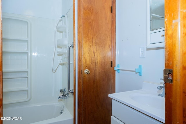 bathroom with vanity and shower / tub combination