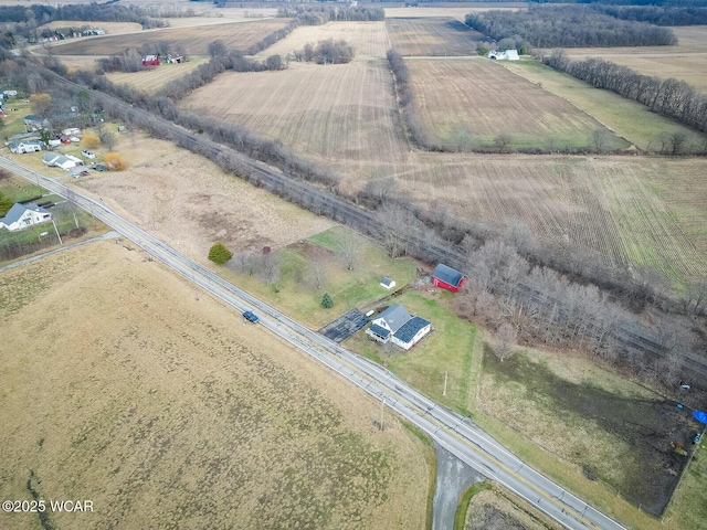 birds eye view of property featuring a rural view