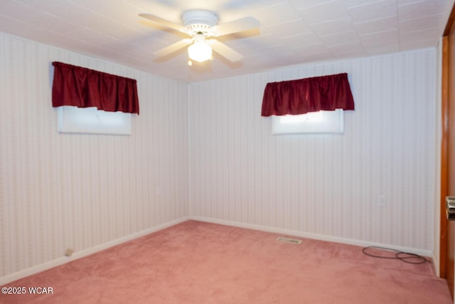 carpeted empty room with ceiling fan