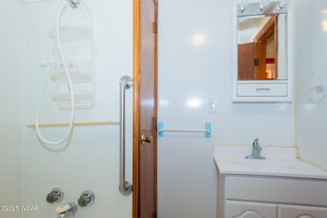 bathroom featuring vanity and tub / shower combination