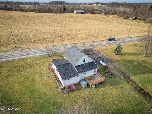 birds eye view of property featuring a rural view