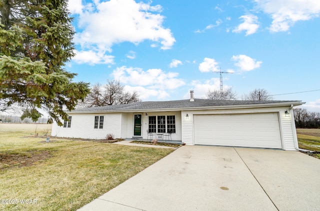 single story home featuring a garage and a front yard