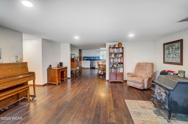 sitting room featuring dark hardwood / wood-style floors