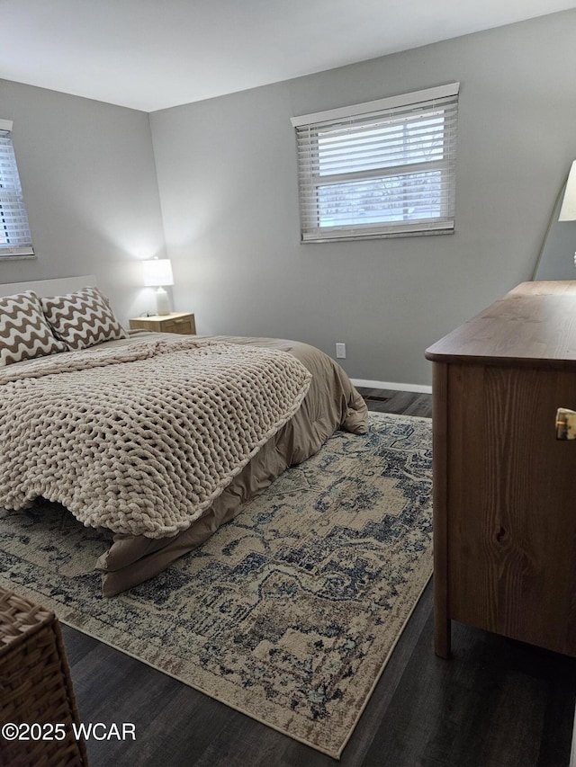 bedroom featuring wood finished floors