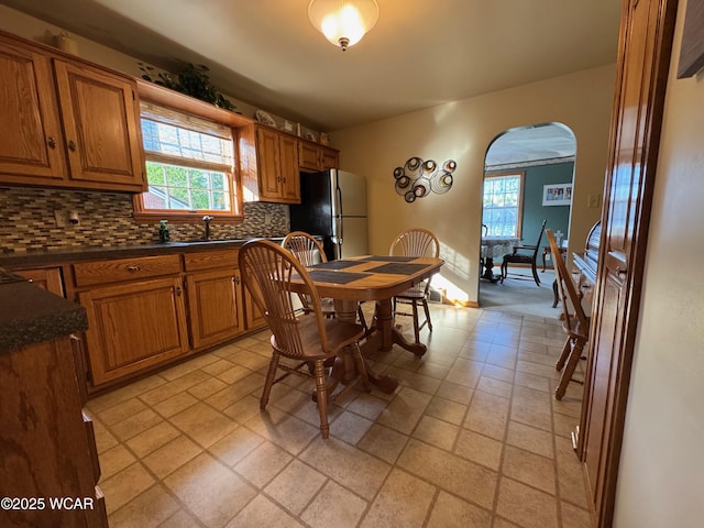 242 S Main St, Ottawa, OH 45875 - dining space with arched walkways