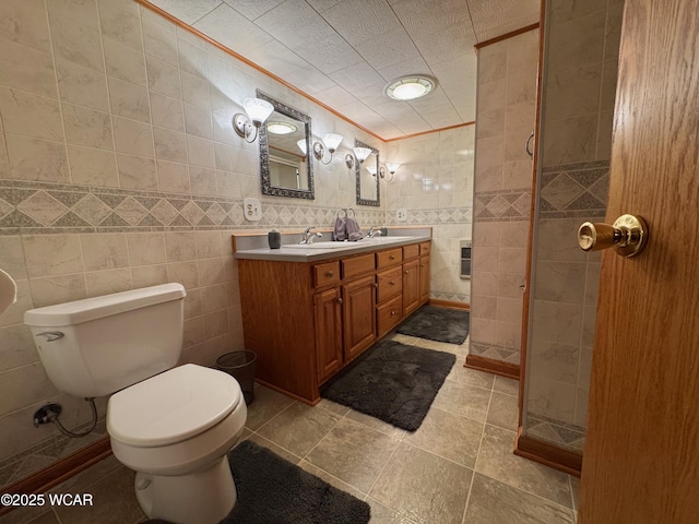 242 S Main St, Ottawa, OH 45875 - bathroom with tile walls, double vanity, and tiled shower