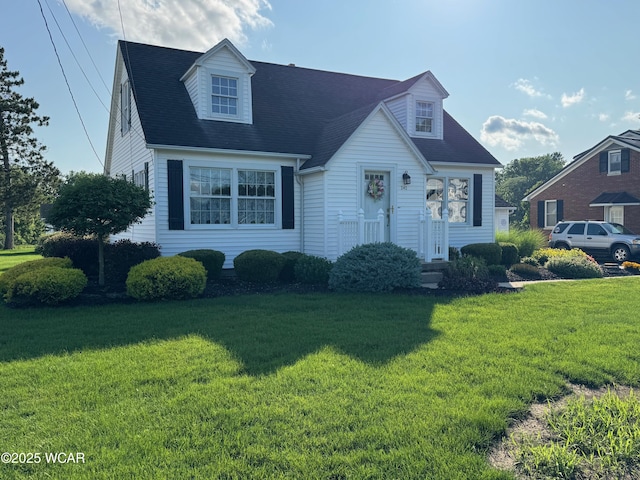 242 S Main St, Ottawa, OH 45875 - cape cod-style house featuring a front yard