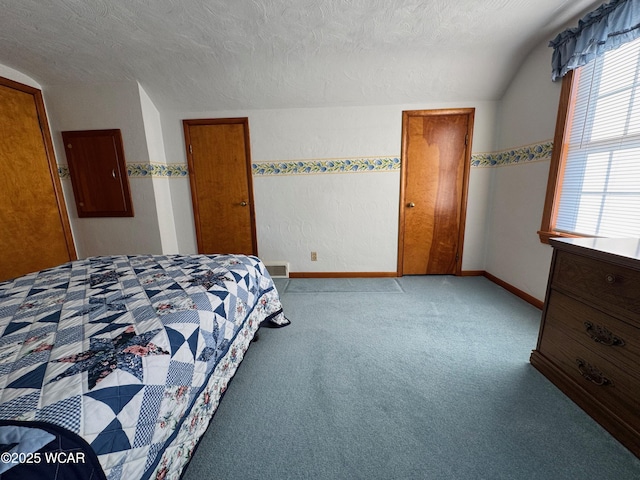 242 S Main St, Ottawa, OH 45875 - carpeted bedroom featuring a textured ceiling and baseboards