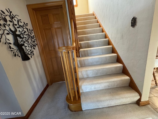 242 S Main St, Ottawa, OH 45875 - staircase featuring carpet flooring and a textured wall