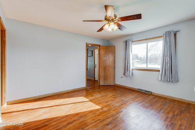 unfurnished bedroom with wood-type flooring and ceiling fan