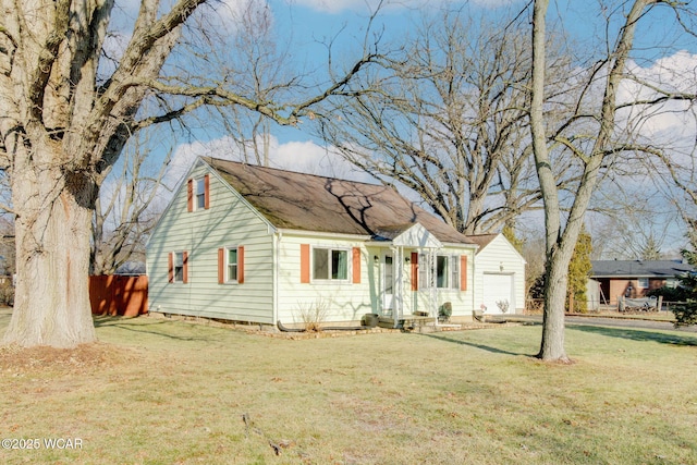 view of front of house featuring a garage and a front yard