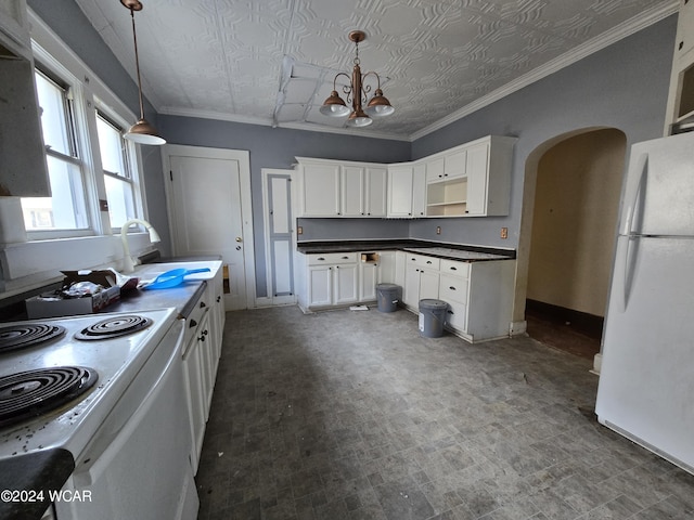 kitchen featuring arched walkways, pendant lighting, dark countertops, white cabinets, and white appliances