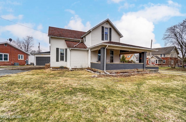 view of front of property featuring covered porch, cooling unit, and a front yard