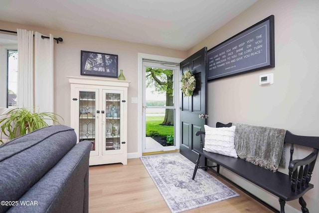 2440 E Bluelick Rd, Lima, OH 45801 - sitting room with french doors and light wood-style floors