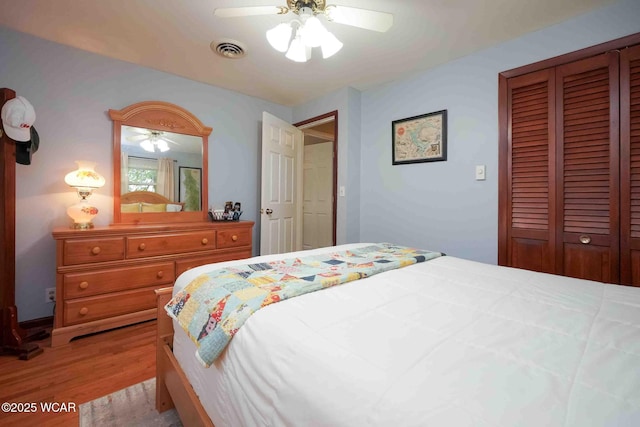 2440 E Bluelick Rd, Lima, OH 45801 - bedroom with wood finished floors, a closet, and ceiling fan