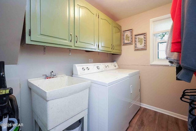 2440 E Bluelick Rd, Lima, OH 45801 - washroom with washer and dryer, cabinet space, dark wood finished floors, and baseboards