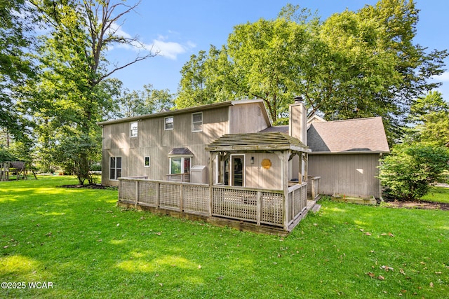 800 Heritage Dr, Lima, OH 45804 - back of property featuring a chimney, a yard, and a wooden deck