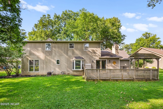 800 Heritage Dr, Lima, OH 45804 - rear view of house with a yard, a chimney, a wooden deck, and a gazebo