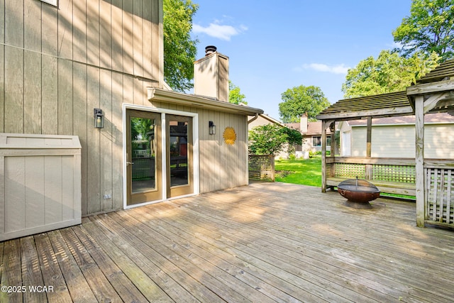 800 Heritage Dr, Lima, OH 45804 - wooden deck with a fire pit