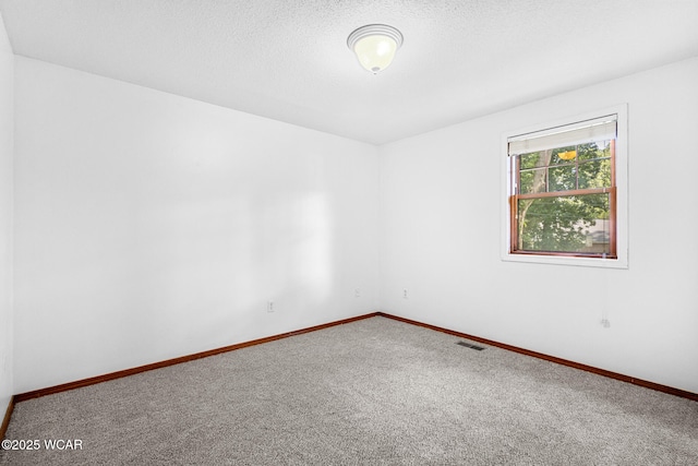 800 Heritage Dr, Lima, OH 45804 - empty room with carpet floors and baseboards