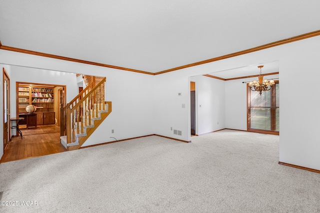 800 Heritage Dr, Lima, OH 45804 - unfurnished living room with carpet, a chandelier, stairway, and crown molding
