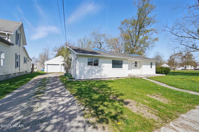 402 S Fifth St, Continental, OH 45831 - bungalow-style house with an outbuilding, a front yard, and a garage