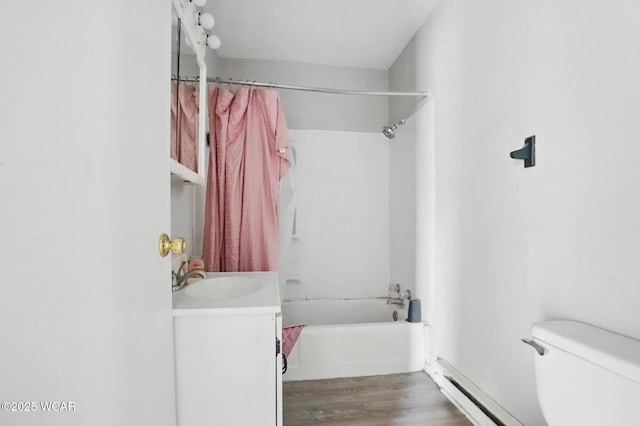 402 S Fifth St, Continental, OH 45831 - bathroom featuring a baseboard radiator, shower / tub combo, toilet, wood finished floors, and vanity