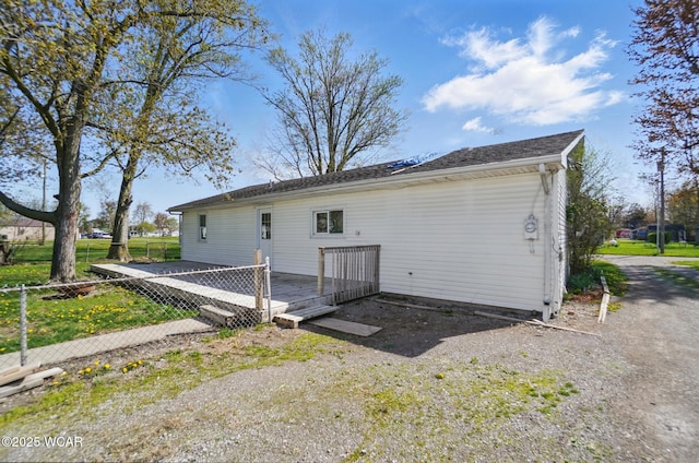 402 S Fifth St, Continental, OH 45831 - rear view of house with fence and a wooden deck