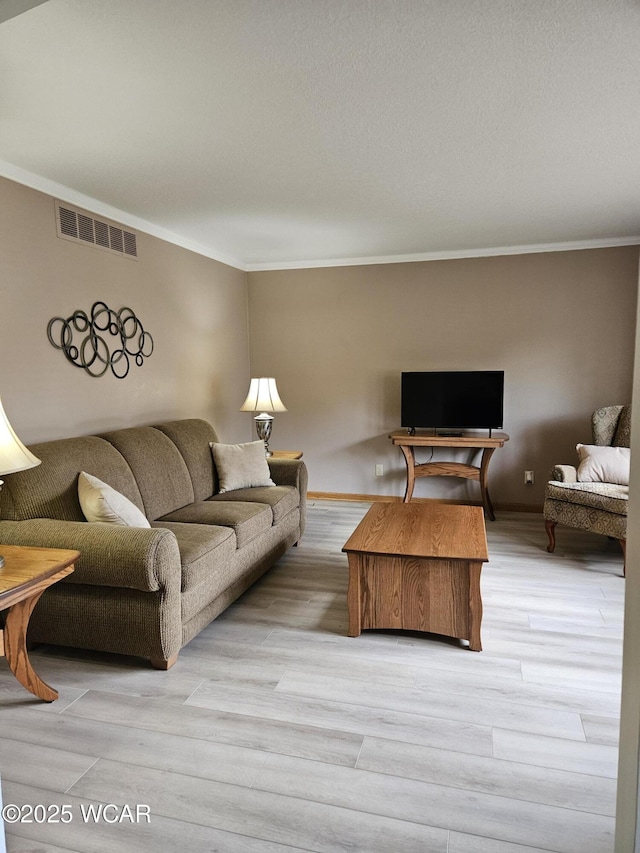 1756 Jo Jean Rd, Lima, OH 45806 - living room featuring ornamental molding and light wood-style floors