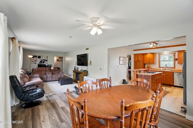 616 N Dix St, Paulding, OH 45879 - dining area featuring light wood-type flooring and a ceiling fan