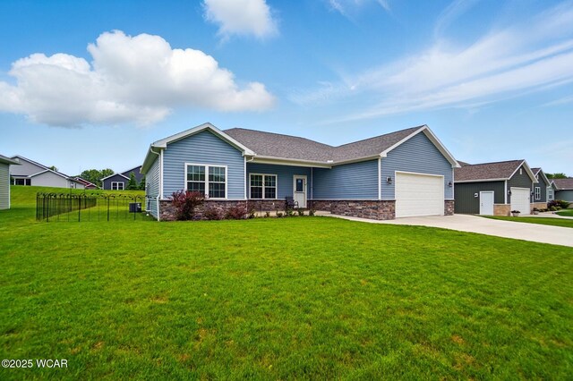 3467 Weldon Dr, Lima, OH 45806 - ranch-style house with a garage, driveway, a shingled roof, and stone siding