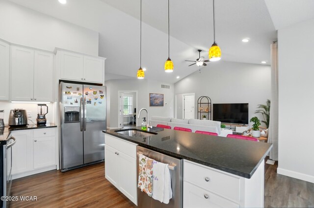 3467 Weldon Dr, Lima, OH 45806 - kitchen featuring stainless steel appliances, a sink, dark wood-style floors, open floor plan, and white cabinets