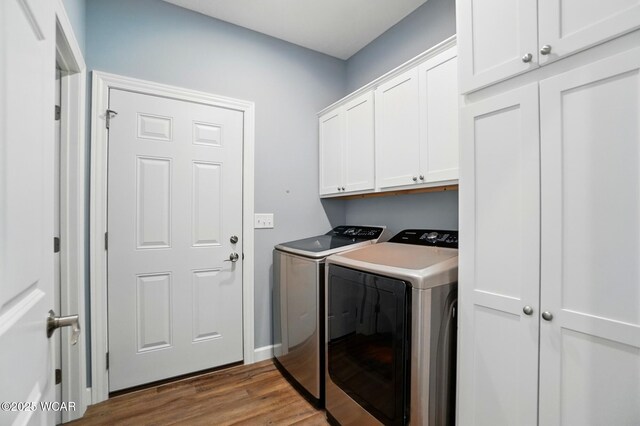3467 Weldon Dr, Lima, OH 45806 - washroom with washer and clothes dryer, cabinet space, wood finished floors, and baseboards