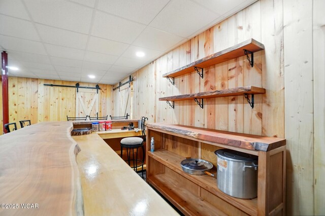 3467 Weldon Dr, Lima, OH 45806 - bar area with wood walls and a drop ceiling