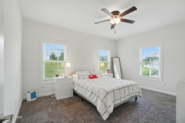 3467 Weldon Dr, Lima, OH 45806 - bedroom featuring dark carpet, baseboards, and ceiling fan