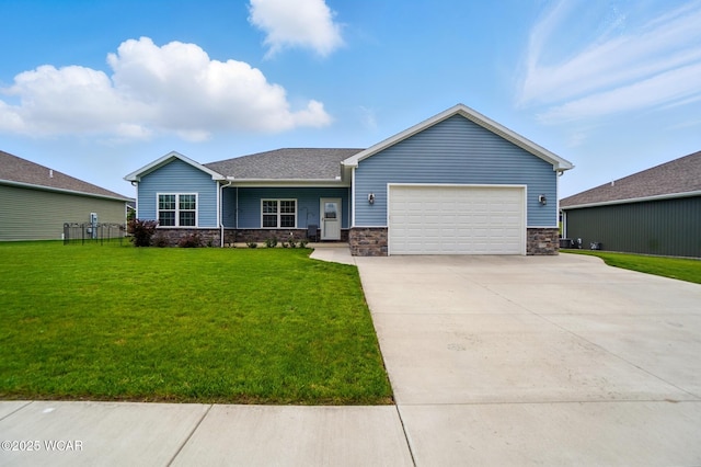 3467 Weldon Dr, Lima, OH 45806 - ranch-style house with a garage, a front lawn, driveway, stone siding, and a shingled roof