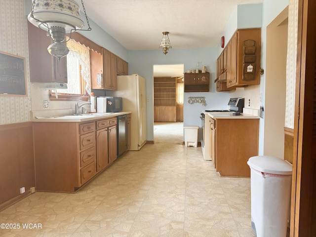 kitchen featuring light countertops, stainless steel dishwasher, light floors, white range with electric cooktop, and wallpapered walls