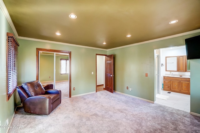 sitting room featuring light carpet, baseboards, crown molding, and recessed lighting