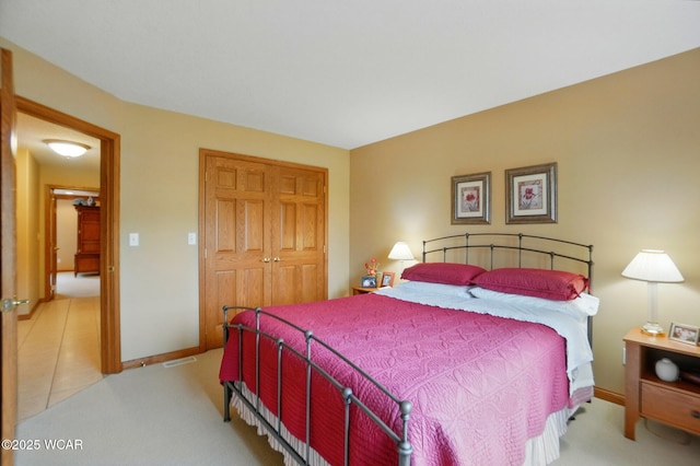 4042 Bur Oak Trl, Lima, OH 45807 - carpeted bedroom with a closet and baseboards
