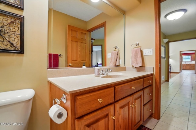 4042 Bur Oak Trl, Lima, OH 45807 - half bath with tile patterned flooring, toilet, and vanity