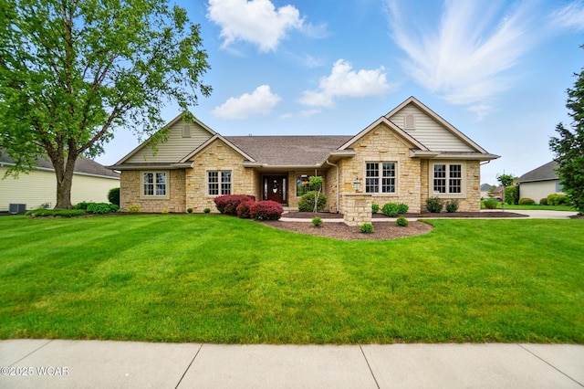 4042 Bur Oak Trl, Lima, OH 45807 - ranch-style house featuring stone siding and a front lawn