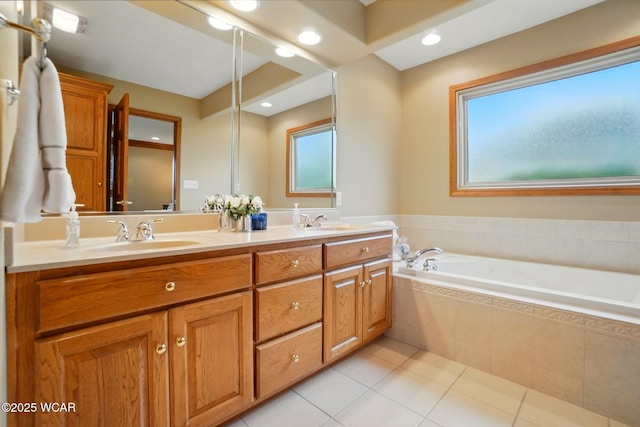 4042 Bur Oak Trl, Lima, OH 45807 - full bath with double vanity, tile patterned floors, and a garden tub
