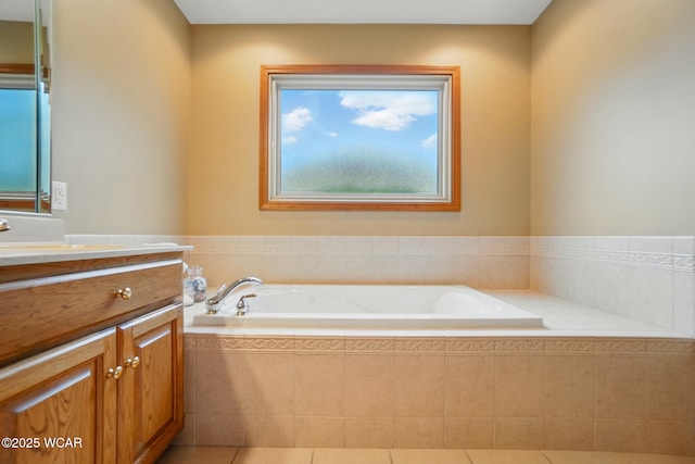 4042 Bur Oak Trl, Lima, OH 45807 - bathroom featuring vanity, a garden tub, and tile patterned floors