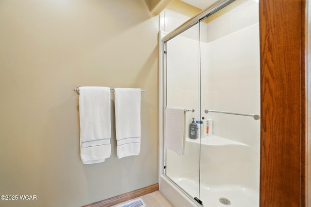 4042 Bur Oak Trl, Lima, OH 45807 - bathroom featuring a shower with shower door and tile patterned floors